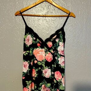 Rand new. Light weight summer dress with adjustable straps.